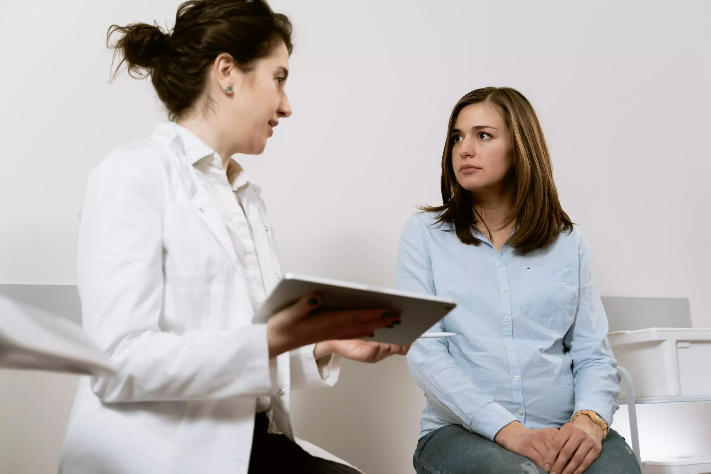 A patient speaking to her doctor.