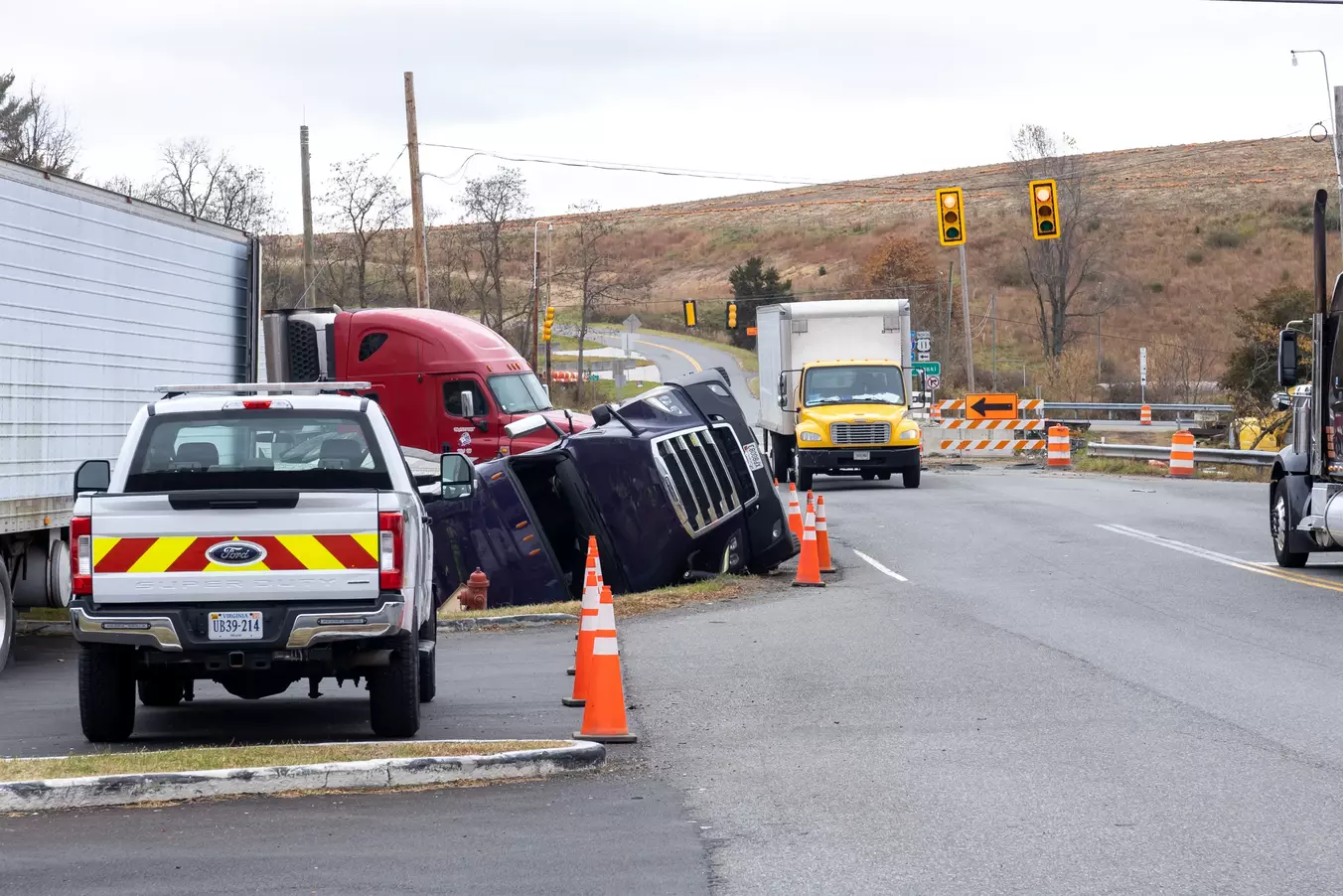 Commercial truck wrecked in a ditch.