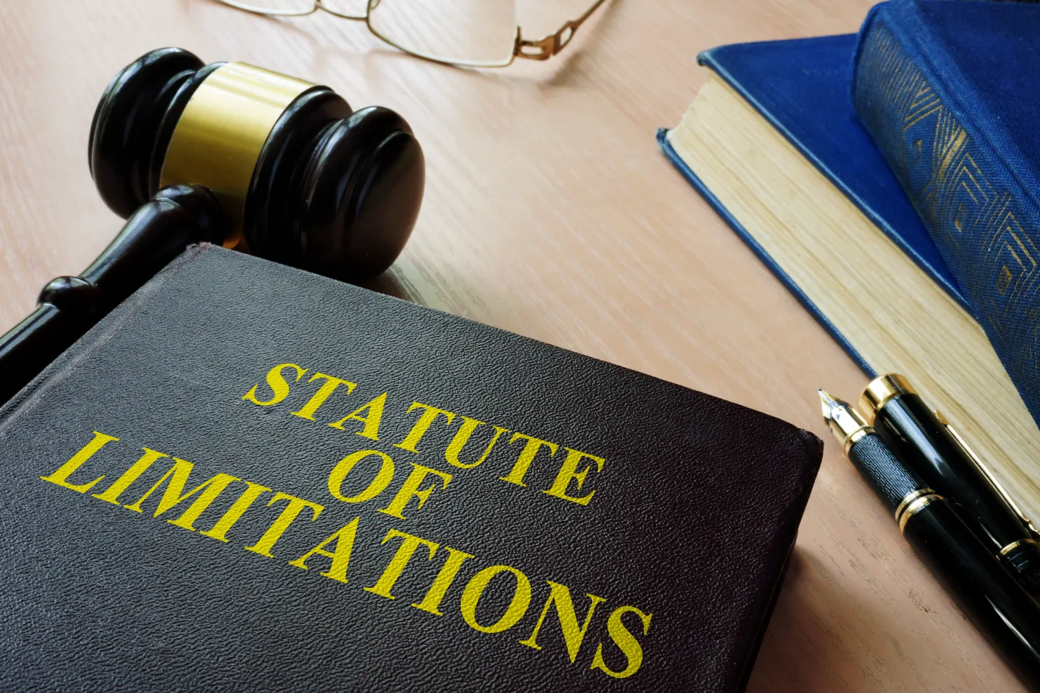 A book that says "Statute of Limitations".