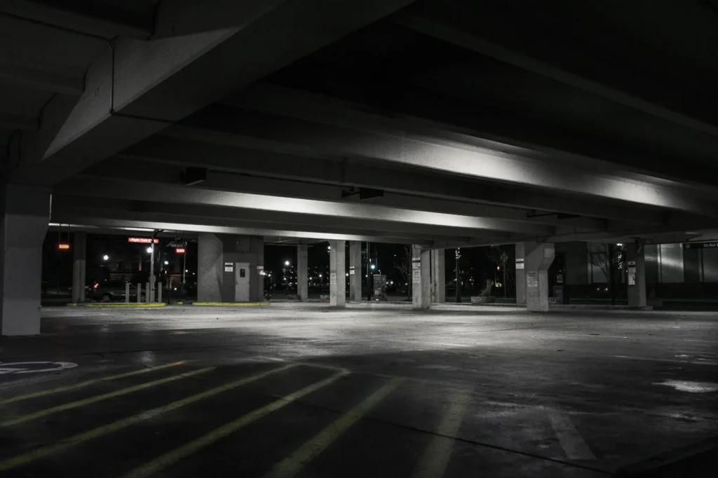 A dark parking garage.