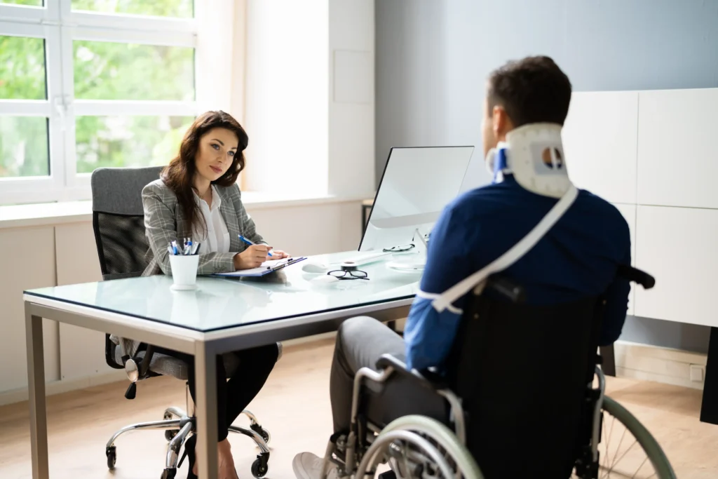 An injured person talking to an attorney.